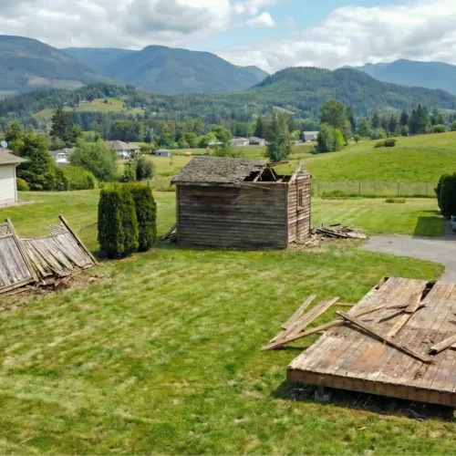 light-demolition-removal-services A yard containing small structures which are falling apart on a residential property in the lower mainland.